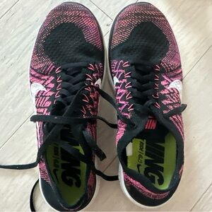 Nike Black and Pink Sneakers with Knit Upper and Geometric Pattern